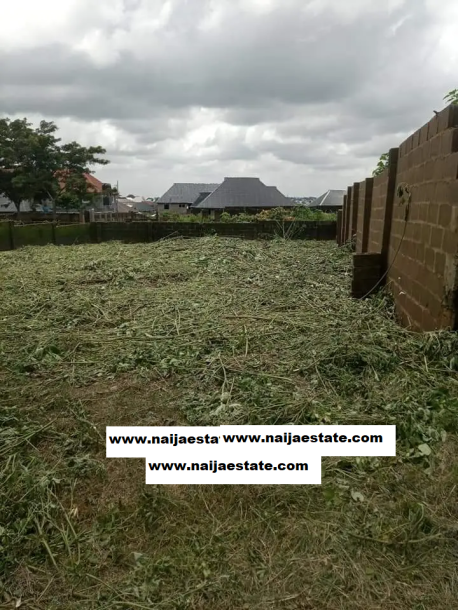 A Plot of Land With Fence at Arikisin-1